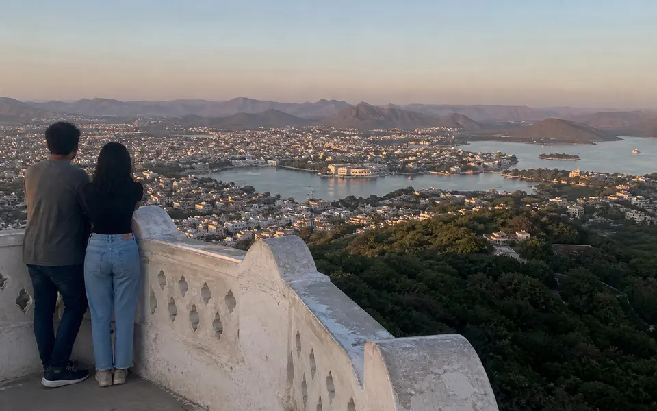 View over Udaipur’s lakes and the Aravalli hills from the terrace of Monsoon Palace at late afternoon light.
