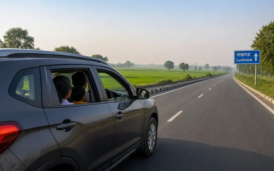 Family from Lucknow driving past green fields on a winter morning highway.