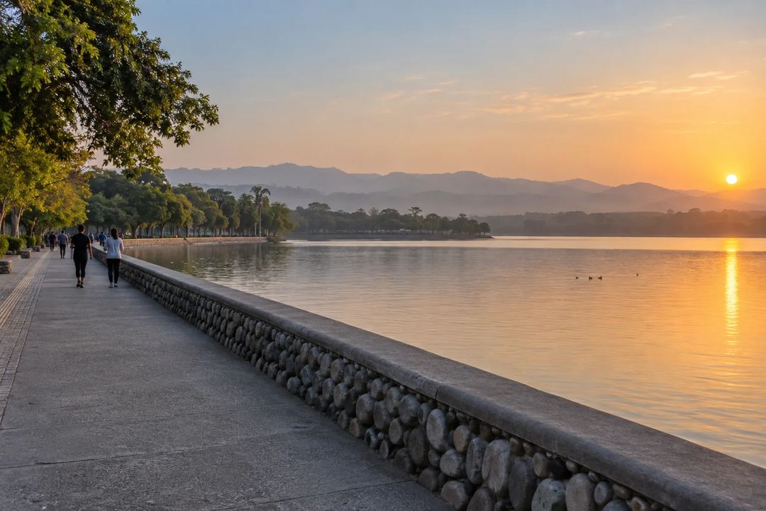 Illustration of visitors on the promenade beside Sukhna Lake at sunset.