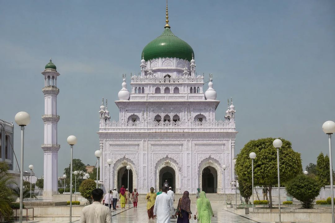 Illustrative view of the domed shrine and courtyard at Dewa Shareef.