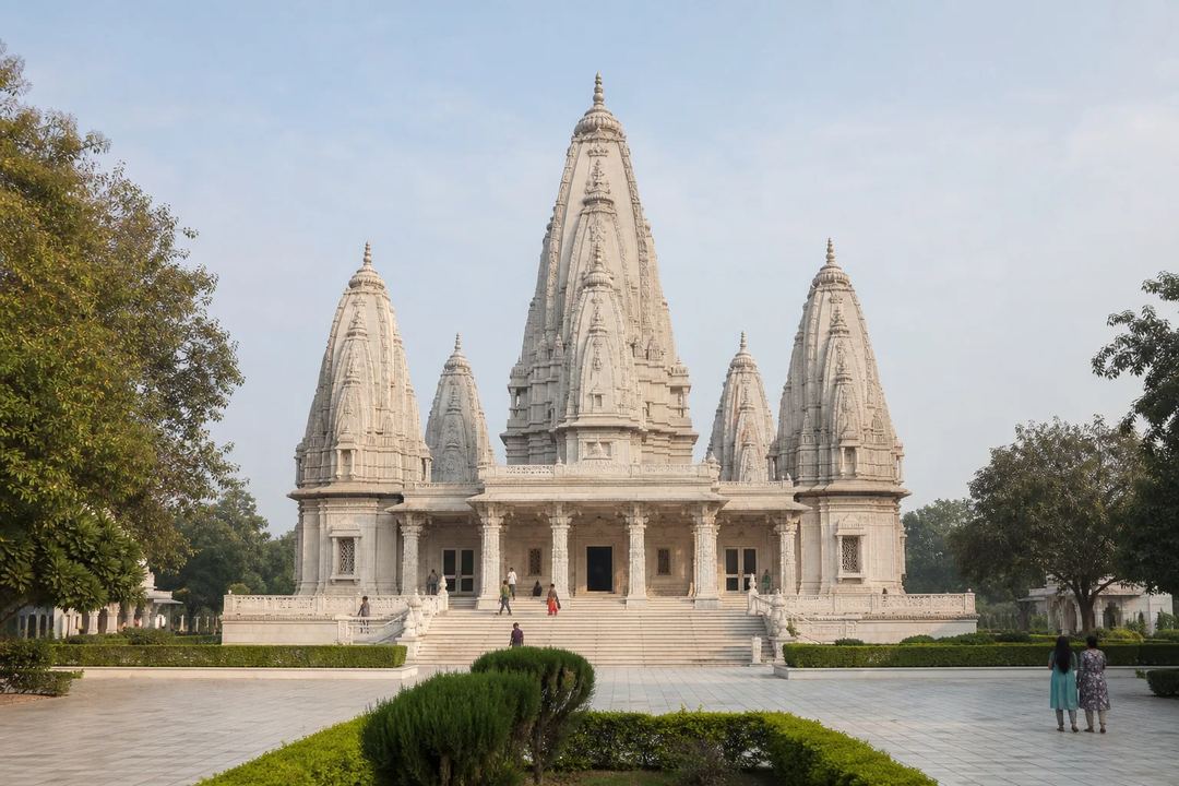 Illustrative view of JK Temple's pale facade and five towers in Kanpur.